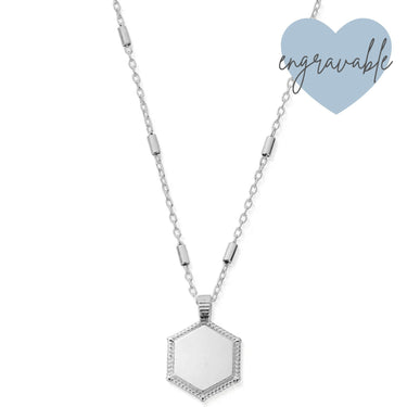 Silver hexagonal pendant necklace on a white background with 'engravable' text.
