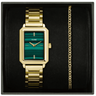 Gold watch with green face and matching chain in a black box