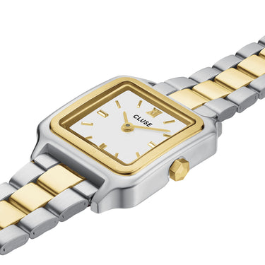 Two-tone watch with gold and silver band on a white background