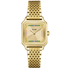 Gold watch with a colorful face on a white background