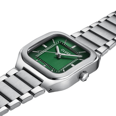 Silver watch with a green face on a white background
