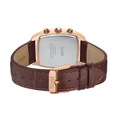 Cluse watch with brown leather strap and rose gold case on a white background