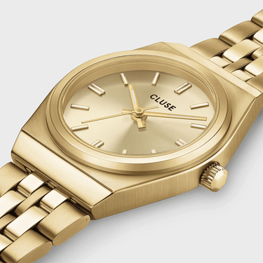 cluse small round face watch with gold link strap