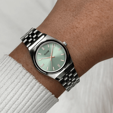 small silver ladies watch in a retro style