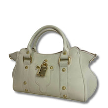Beige handbag with gold accents on a white background