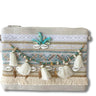 cream-shell-tassel-zip-pouch-bag