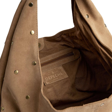 Brown leather bag with visible brand logo on a white background