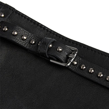 Close-up of a black leather belt with studs on a white background