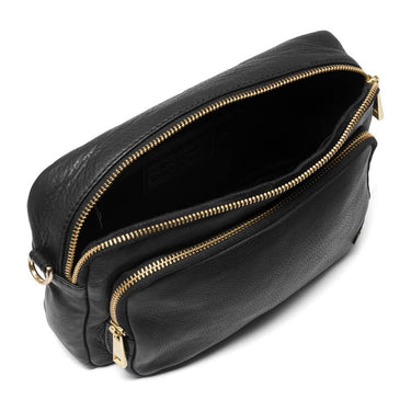 Black leather bag with gold zipper on a white background