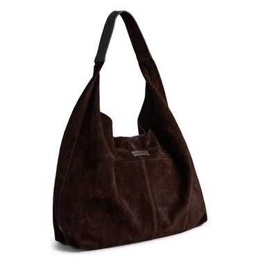 Brown suede handbag on a white background