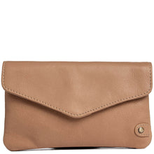 Tan leather flap over purse on a white background