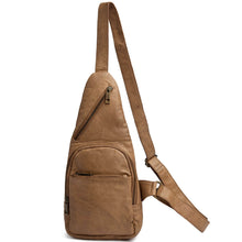 Brown leather sling bag on a white background