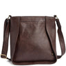 A dark brown leather shoulder bag with a wide front flap and a long adjustable strap, shown on a plain white background.