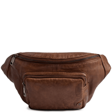 Brown leather waist bag on a white background