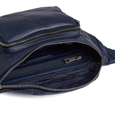 Navy blue leather bag with zippers on a white background