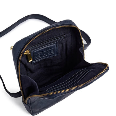 Navy blue handbag with gold zipper on a white background