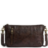A dark brown distressed leather crossbody bag with a front vertical zipper pocket and antique brass hardware, shown against a plain white background.