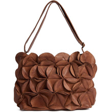 A brown leather shoulder bag with a textured, layered petal-like design and a single shoulder strap, shown against a plain white background.
