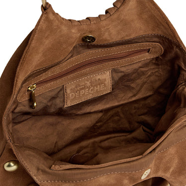 Brown leather bag with visible brand logo on a white background