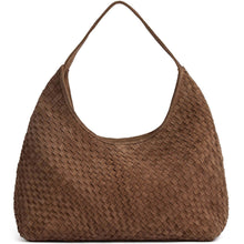 Brown woven handbag on a white background