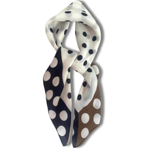 Polka dot scarf in black, white, and brown on a white background
