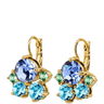 Gold earrings with blue and green gemstones on a white background