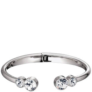 A polished silver-tone open cuff bangle bracelet with three clear round-cut rhinestones set at each end, shown on a plain white background.