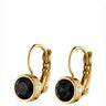Gold hoop earrings with black gemstones on a white background