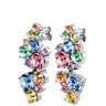 Multicolored gemstone earrings on a white background