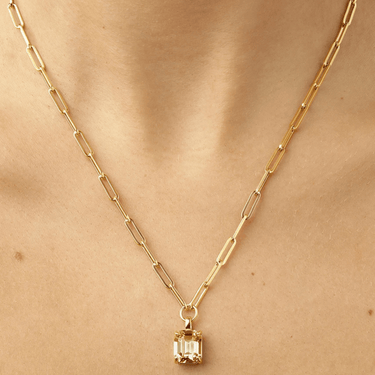 ladies gold oval link necklace with golden tones square crystal