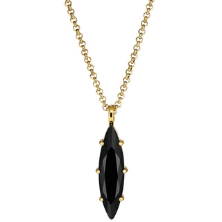 Gold necklace with a black pendant on a white background
