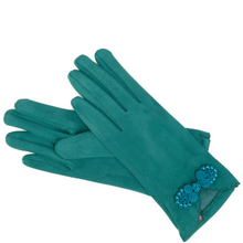 Pair of teal gloves with decorative elements on a white background