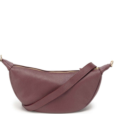 wine toned leather handbag with a gold zipper on a white background