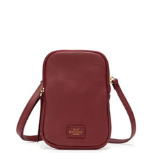 A burgundy pebbled leather crossbody phone bag with gold-tone hardware and a small gold 'RUE BLAICHONY LONDON' logo patch on the front, shown on a clean white background.