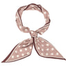 A square silk scarf tied in a knot, featuring a dusty rose pink and white polka dot pattern with a thin dark brown border, set against a solid white background.