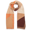 A geometric color-blocked scarf in beige, orange, cream, and dark brown, featuring a fringed edge and thin striped detailing, shown on a plain white background.