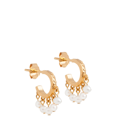 Gold hoop earrings with pearl charms on a white background