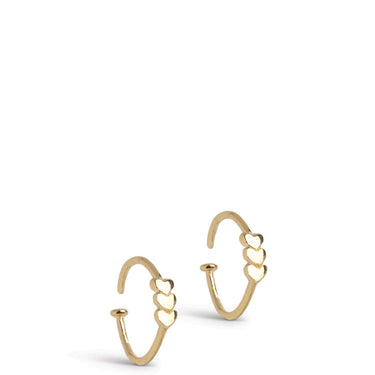 Gold hoop earrings with heart designs on a white background