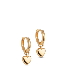 Gold heart-shaped earrings on a white background