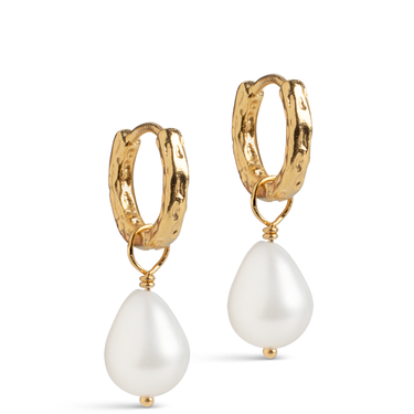 Gold hoop earrings with white pearl drops on a white background