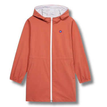 Orange raincoat with a white zipper on a light beige background