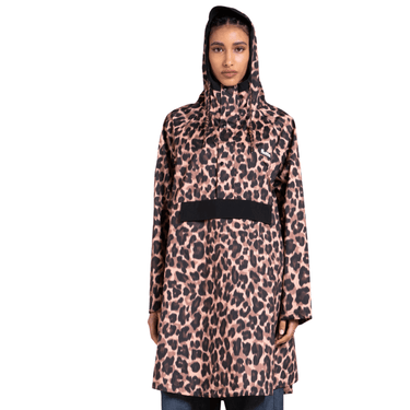 Person wearing a leopard print raincoat on a white background