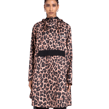 Person wearing a leopard print coat with a black pocket on a white background