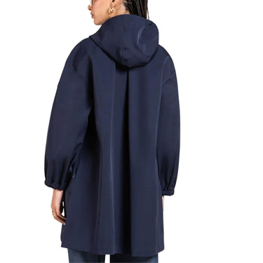 Navy blue raincoat worn by a person on a white background