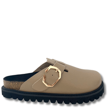 Beige sandal with gold buckle on a white background