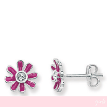 Pink flower-shaped earrings with a clear gemstone on a white background