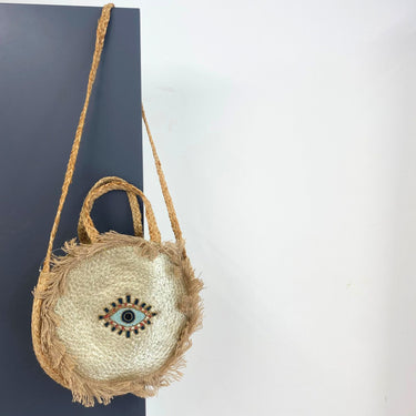 gold-circular-evil-eye-jute-bag