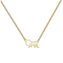 Gold necklace with a pendant on a white background