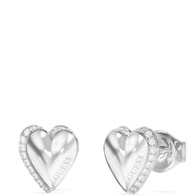 Heart-shaped silver earrings with 'Guess' branding on a white background