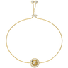Gold bracelet with a circular clasp on a white background